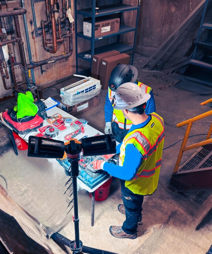 a group of men in a warehouse